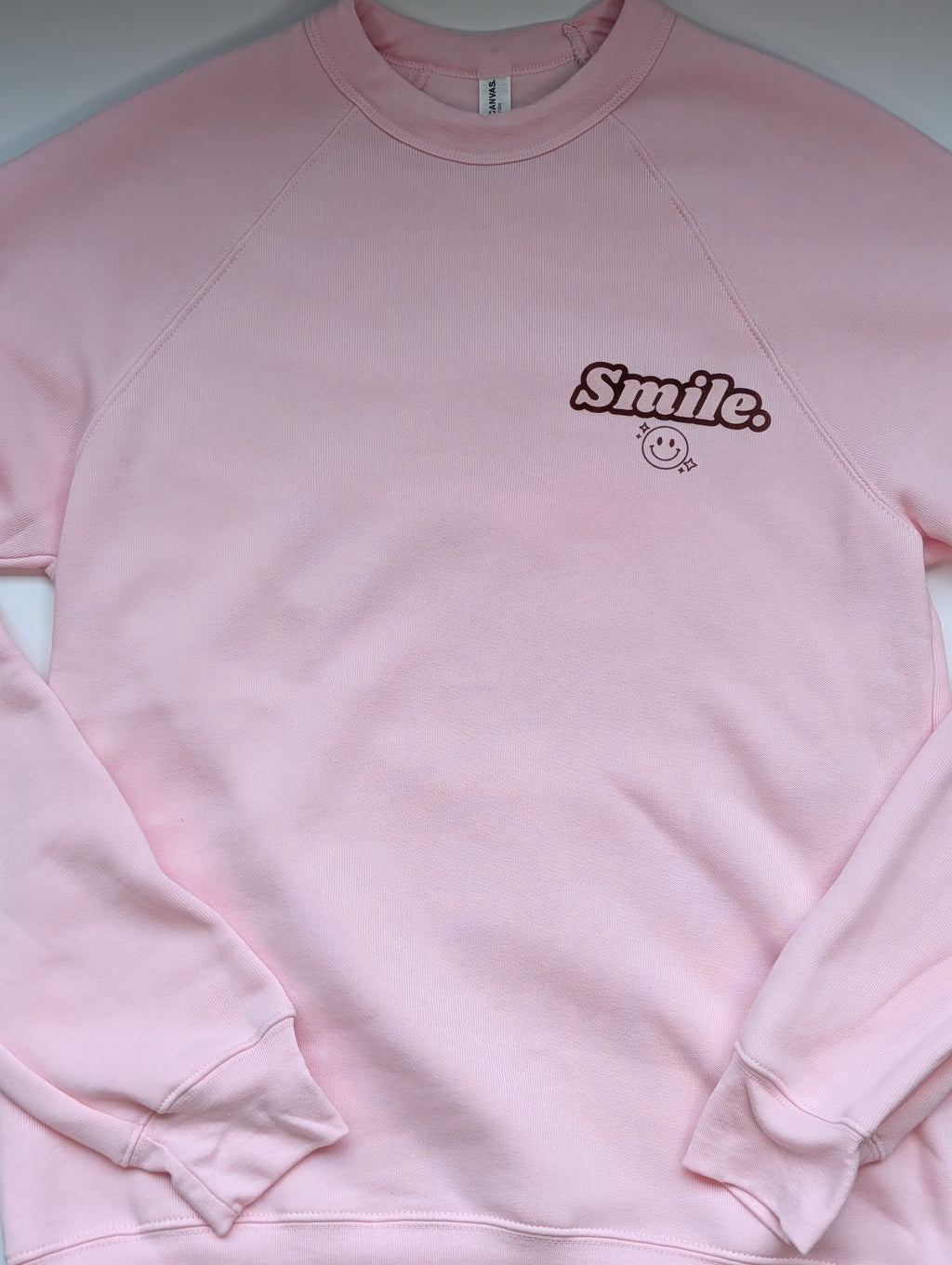 'Smile. Life is supposed to be fun!' Raglan Sleeve Crewneck Sweatshirt
